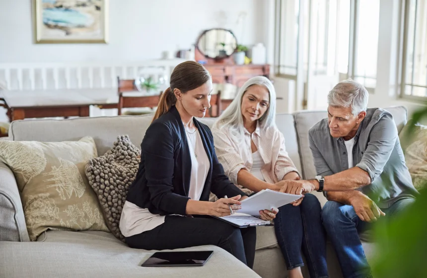 Financial advisors meeting with clients